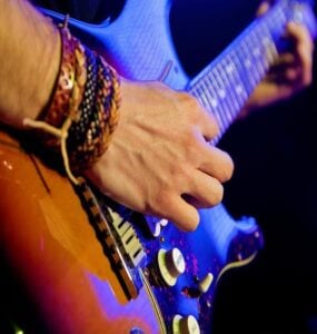 Guitarist, guitar player, close up