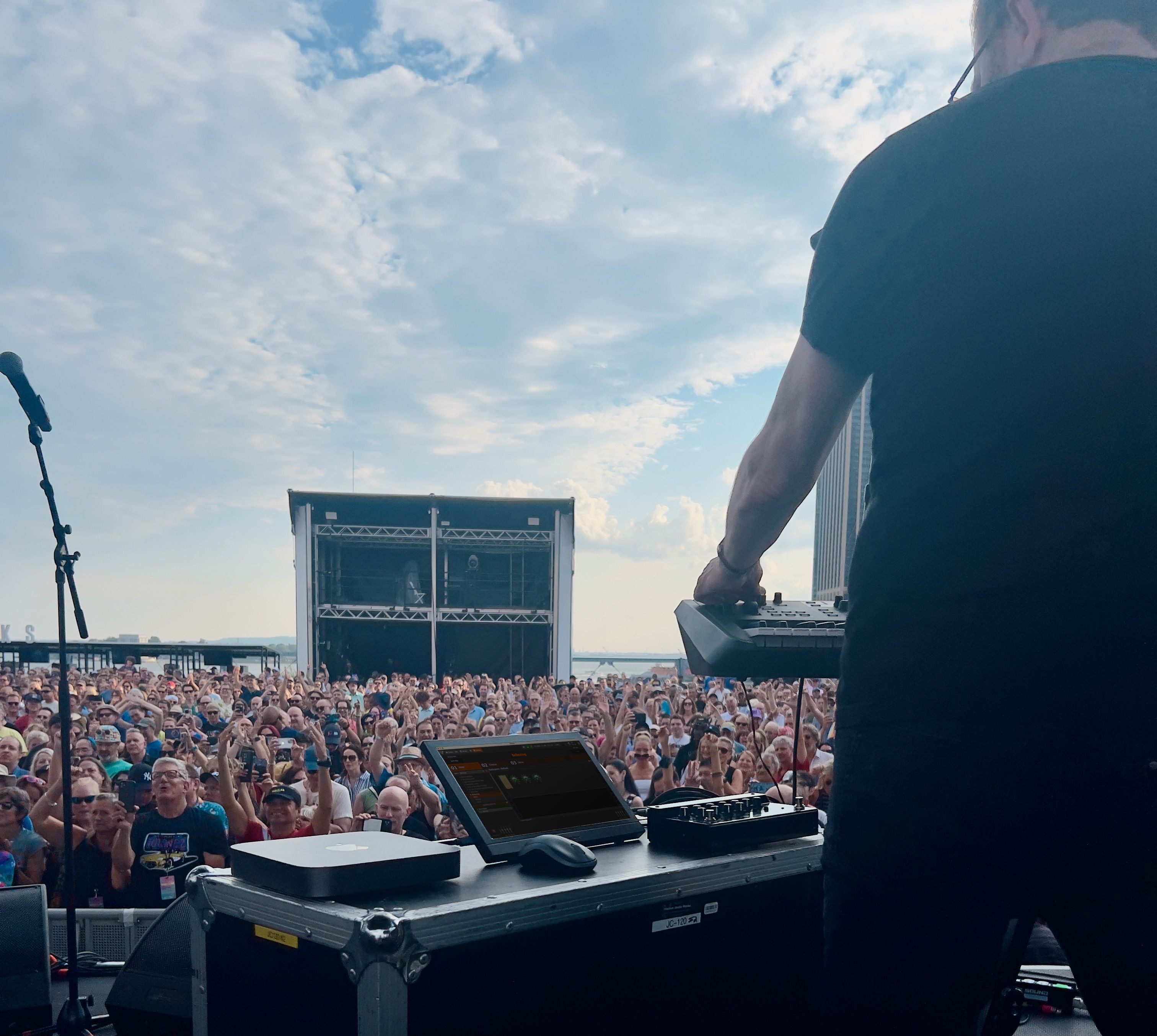 Hands playing a keyboard